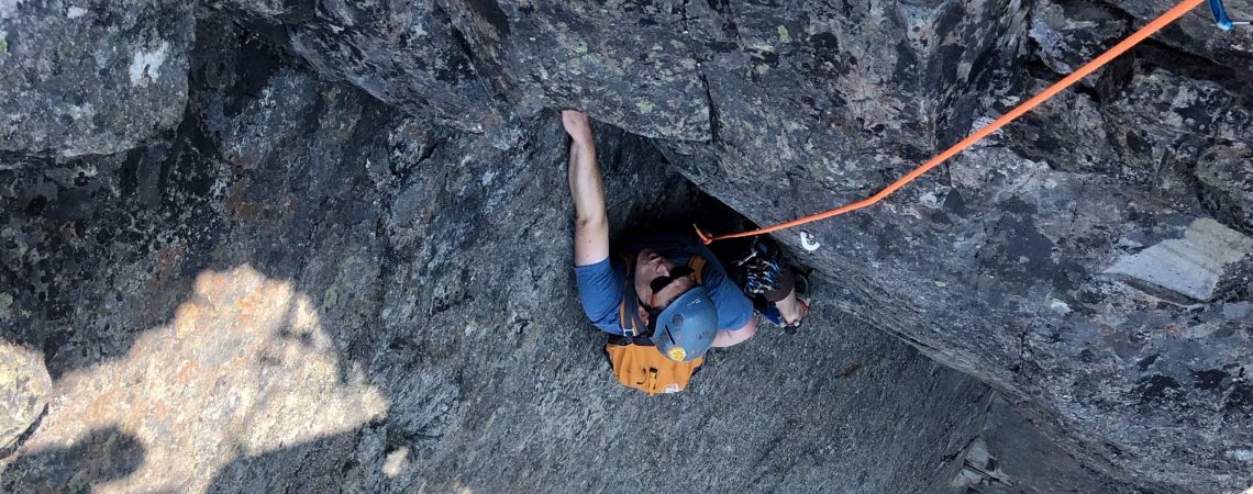 Derek Boiko-Weyrauch following the crux pitch of the Mile High Club on Morning Star Peak.