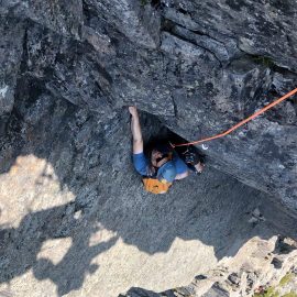 Derek Boiko-Weyrauch following the crux pitch of the Mile High Club on Morning Star Peak.