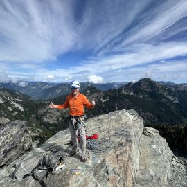 John Yarnall on the Summit of the Tooth after climbing the South Face. Photo by Ian Nicholson