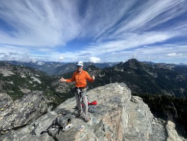 John Yarnall on the Summit of the Tooth after climbing the South Face. Photo by Ian Nicholson