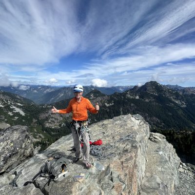 John Yarnall on the Summit of the Tooth after climbing the South Face. Photo by Ian Nicholson