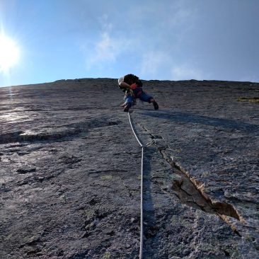 Ian Nicholson leads the immaculate 5.8 splitter crux pitch of True Grit